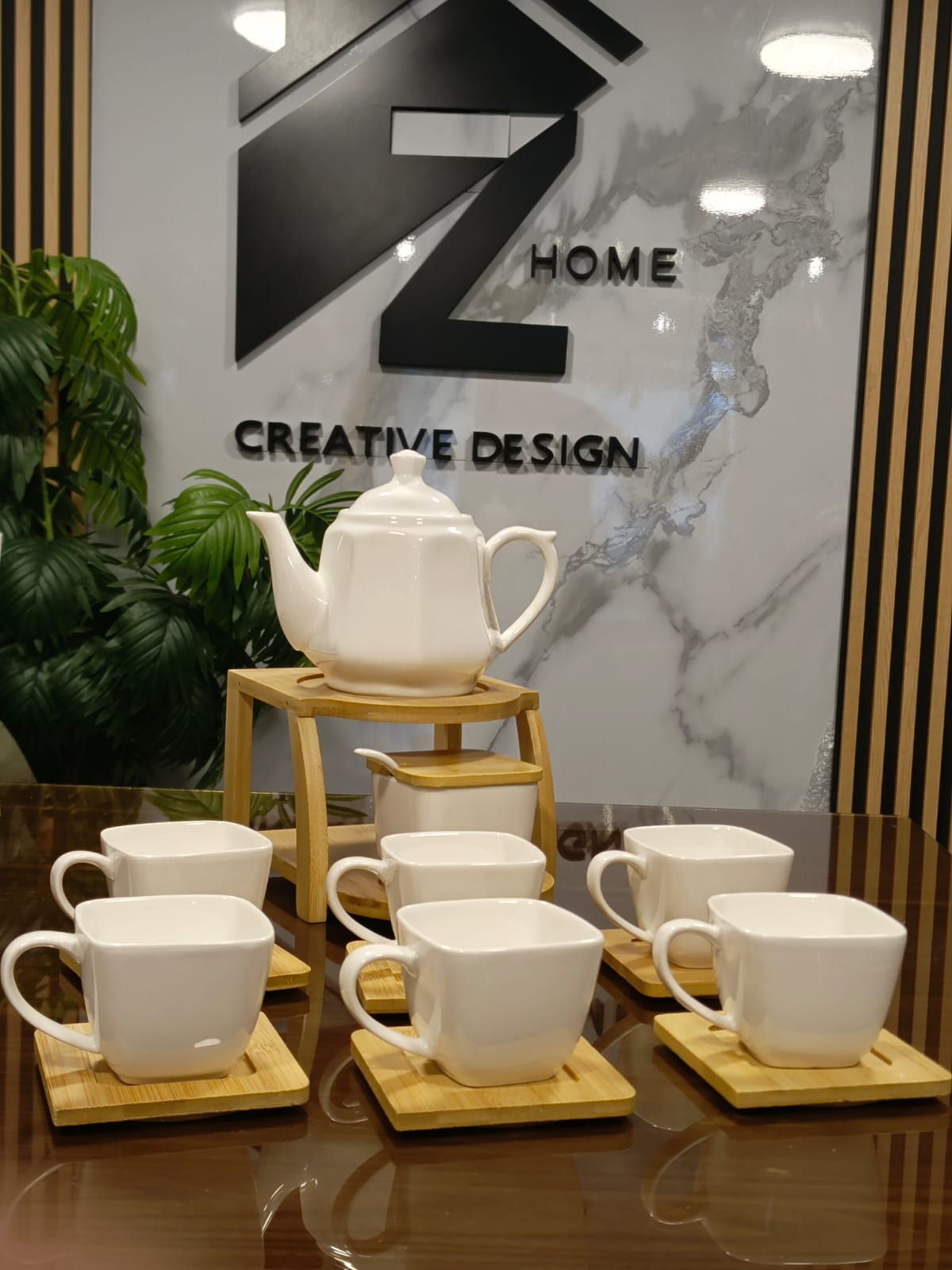 White teapot set with elegant wooden details