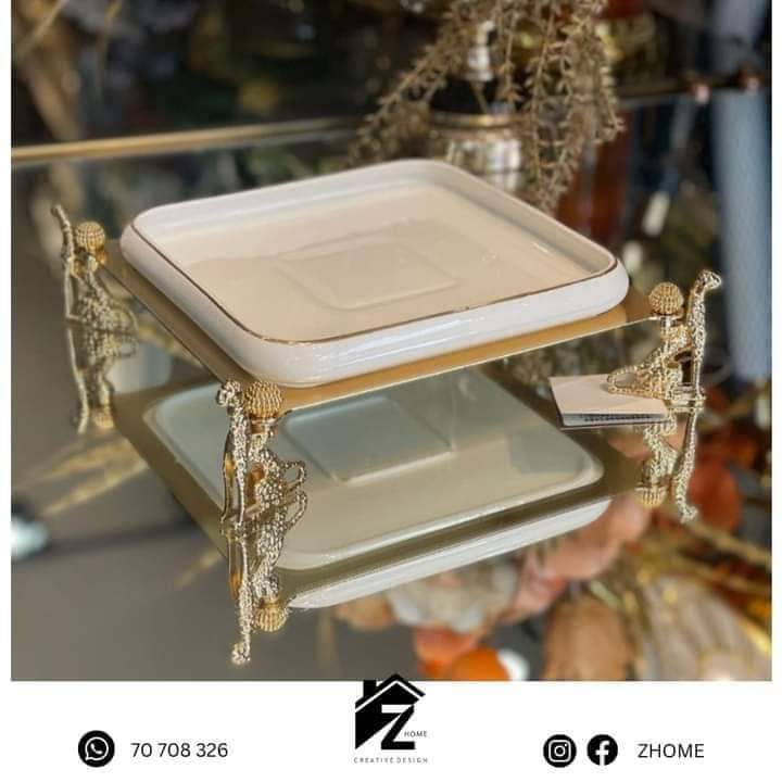 White plate with gold base tiger legs