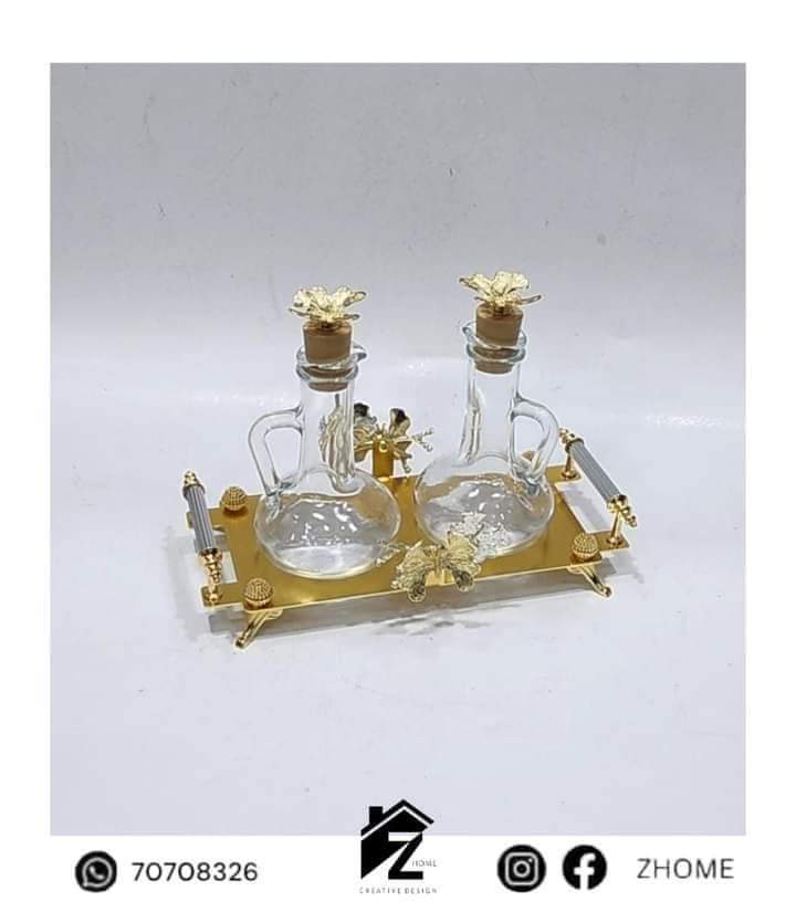 2 oilers with gold tray