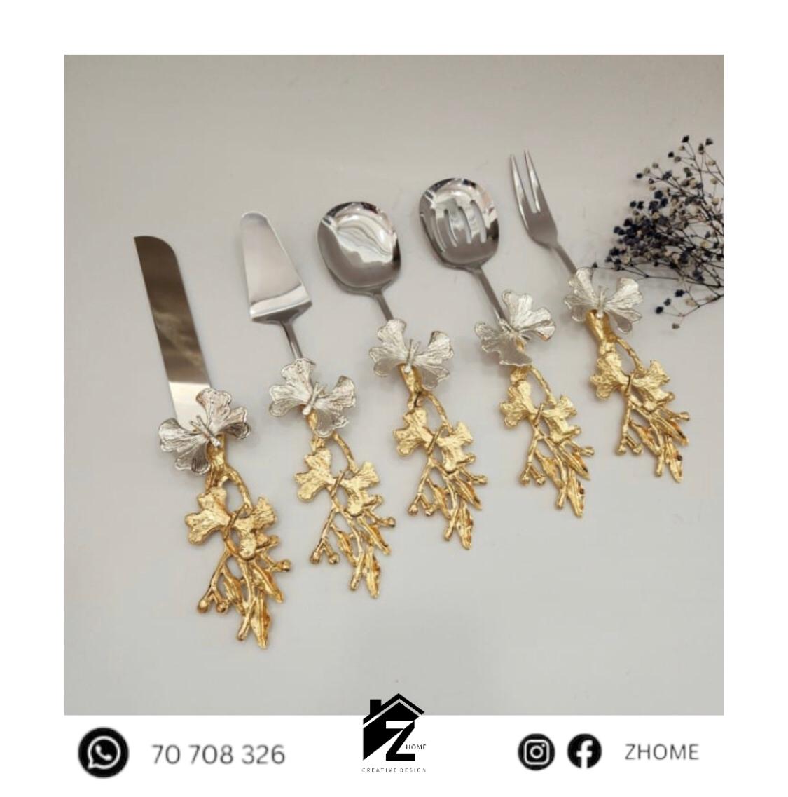 Butterfly figured gold and silver serving set  cutlery collection