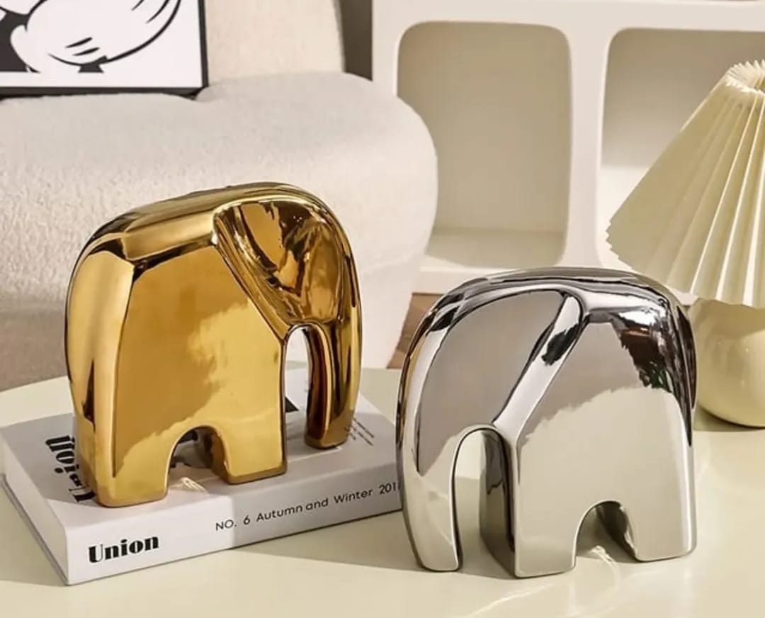 Decorative silver-finished ceramic elephant sculpture - hover