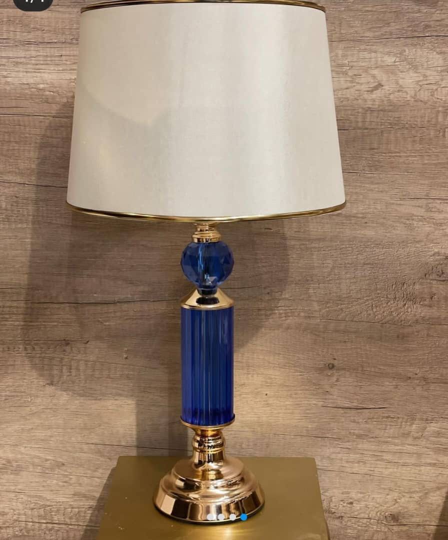 Lampader with off white top and blue crystal stand