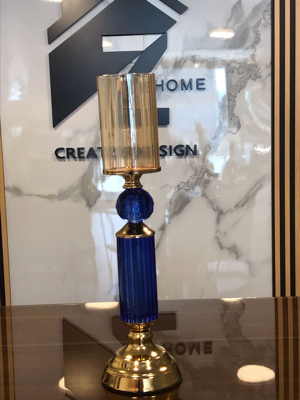 Gold candel holder with blue crystal Stand