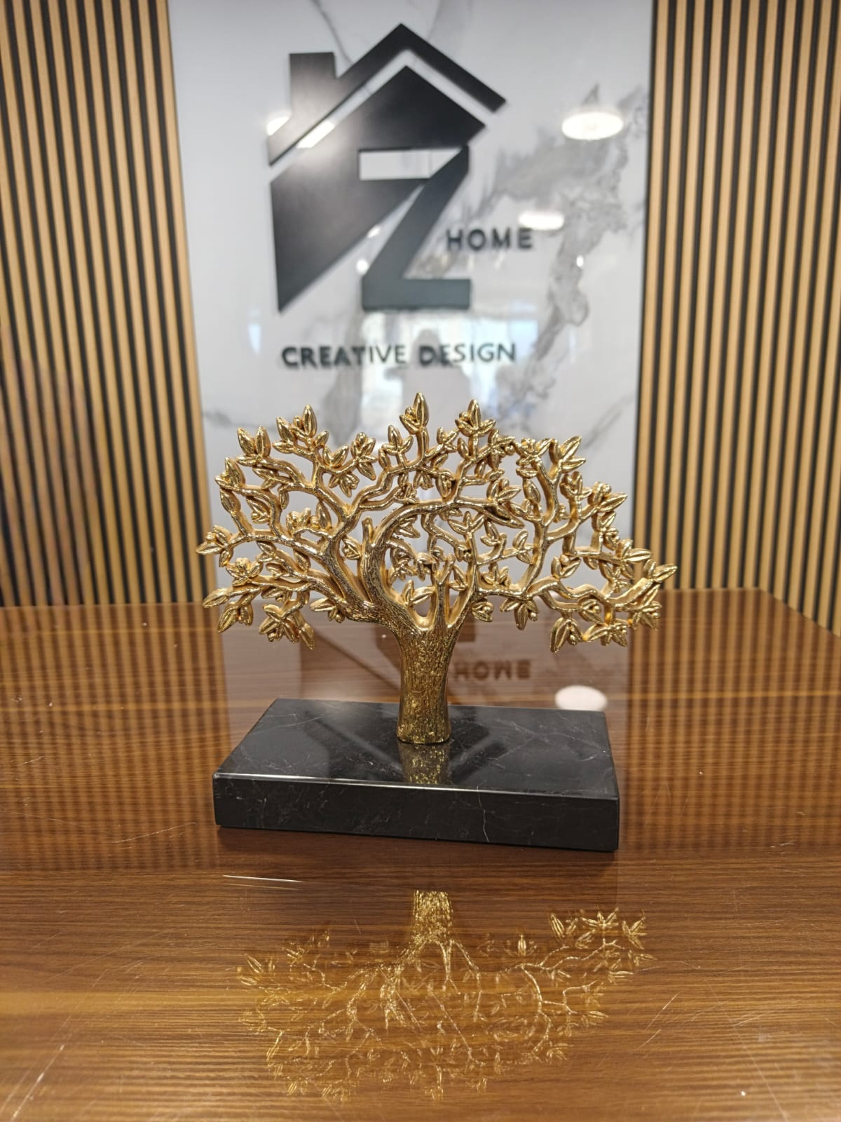 gold tree on black marble